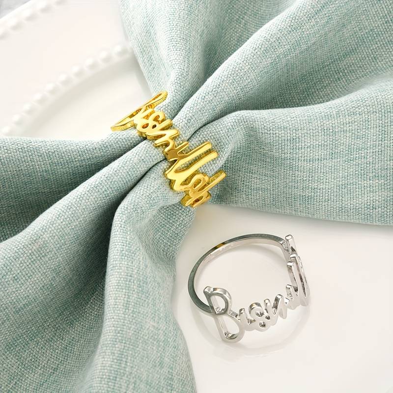 <p><span>Elevate your dinner table with the exquisite Bismillah Napkin Rings. Perfect for any occasion, these rings in a stunning hue feature the word "Bismillah" in Arabic calligraphy, adding a religious and cultural touch to your dining experience.</span></p> <p><span>For those who appreciate the finer things in life, these napkin rings are a must-have, adding an elegant and sophisticated touch to any dinner party or special occasion.</span></p>
