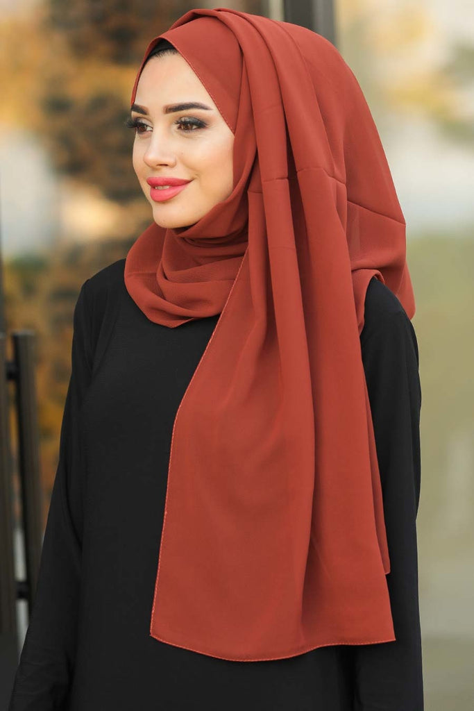 Experience the chic and weightless Chiffon Hijabs that elevate your look to new heights, no matter the occasion. The lightweight fabric drapes effortlessly, giving you that perfect summer look you desire. Explore our vast collection of colors today and elevate your style with confidence!