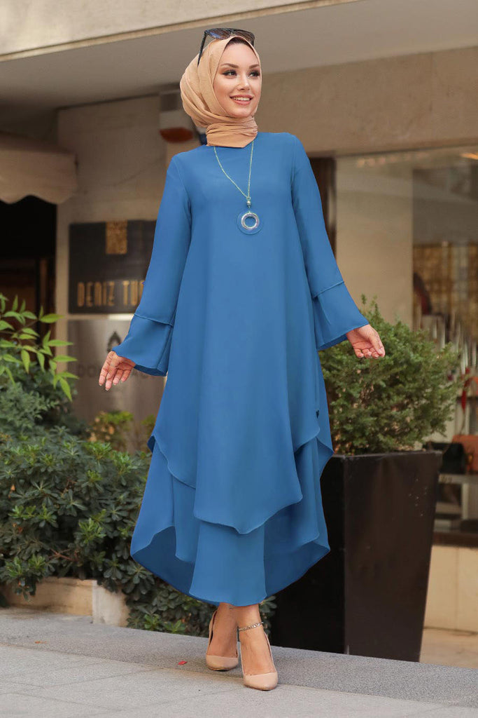 In the game of feminine style, this plain asymmetric tunic dress is your next winning move. Classic elegance with the soft floaty fabric, romantic flared sleeves, and asymmetric hem.
