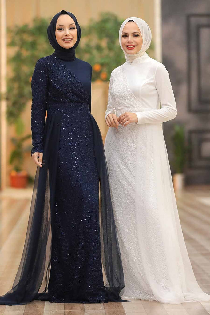 Zareen Ocasion Dress is accented with sparkly sequins all over the dress. It’s cut to a body-skimming silhouette with long sleeves and a double-layer skirt to accentuate your look. This luxurious, figure-flattering gown is the perfect fit for wedding guests, bridesmaids, engagement ceremonies, and much more.  The unique pattern has an attached veil that accentuates your look to the next level, it's the dress where a second look is guaranteed no matter where ever you go. 