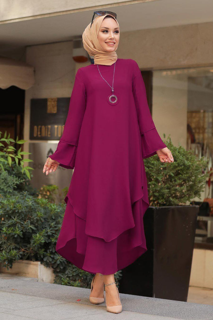 In the game of feminine style, this plain asymmetric tunic dress is your next winning move. Classic elegance with the soft floaty fabric, romantic flared sleeves, and asymmetric hem.